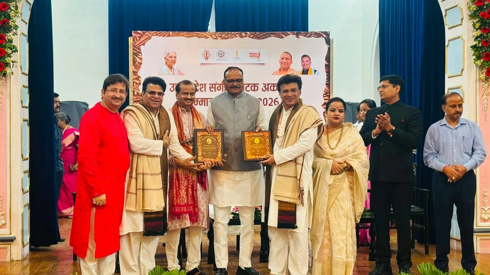 Brajesh Pathak felicitates Pandit Ritesh-Rajnish Mishra and other winners at the UP Academy Awards 2024 ceremony in Lucknow.
